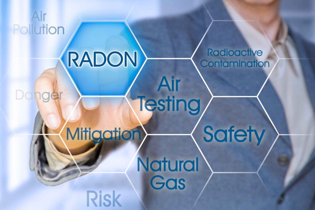 A man in a business suit pointing to a blue hexagon containing the word RADON.